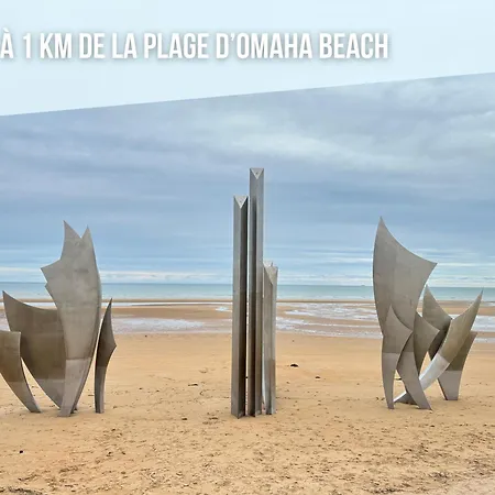 Dom wakacyjny La Brise Marine Rdc Maison Cour Fermee Parking Et Terrasse A 800 M Omaha Avec Table De Ping Pong Proche Port En Bessin